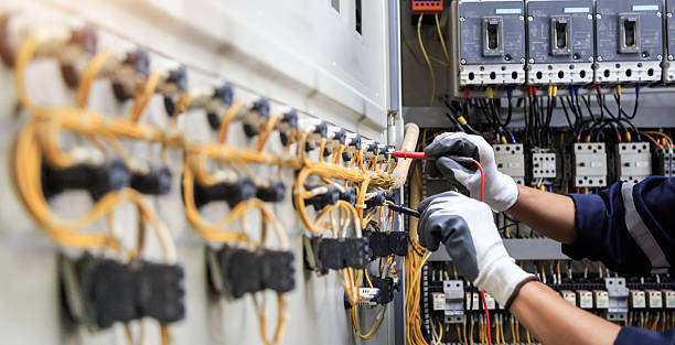 Professional Electrician technician working in Harris Hill, NY